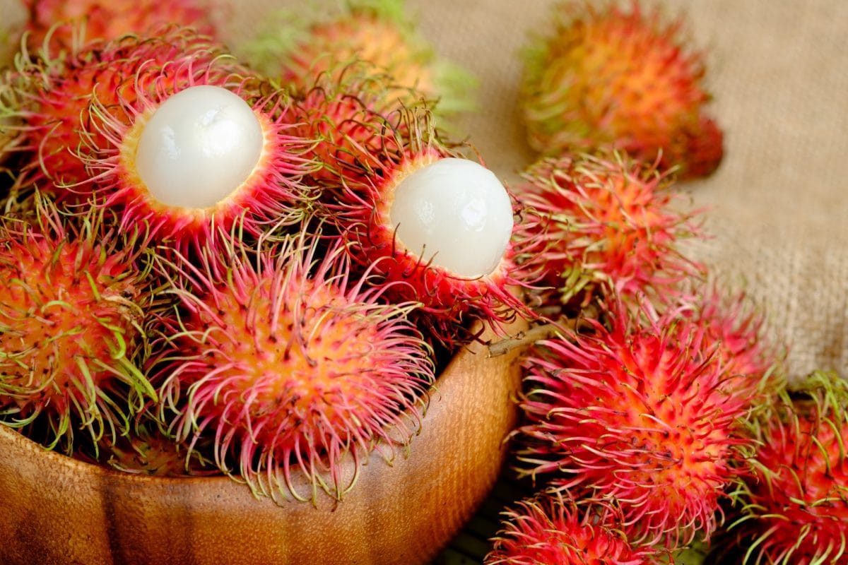 wooden basket of rambutan