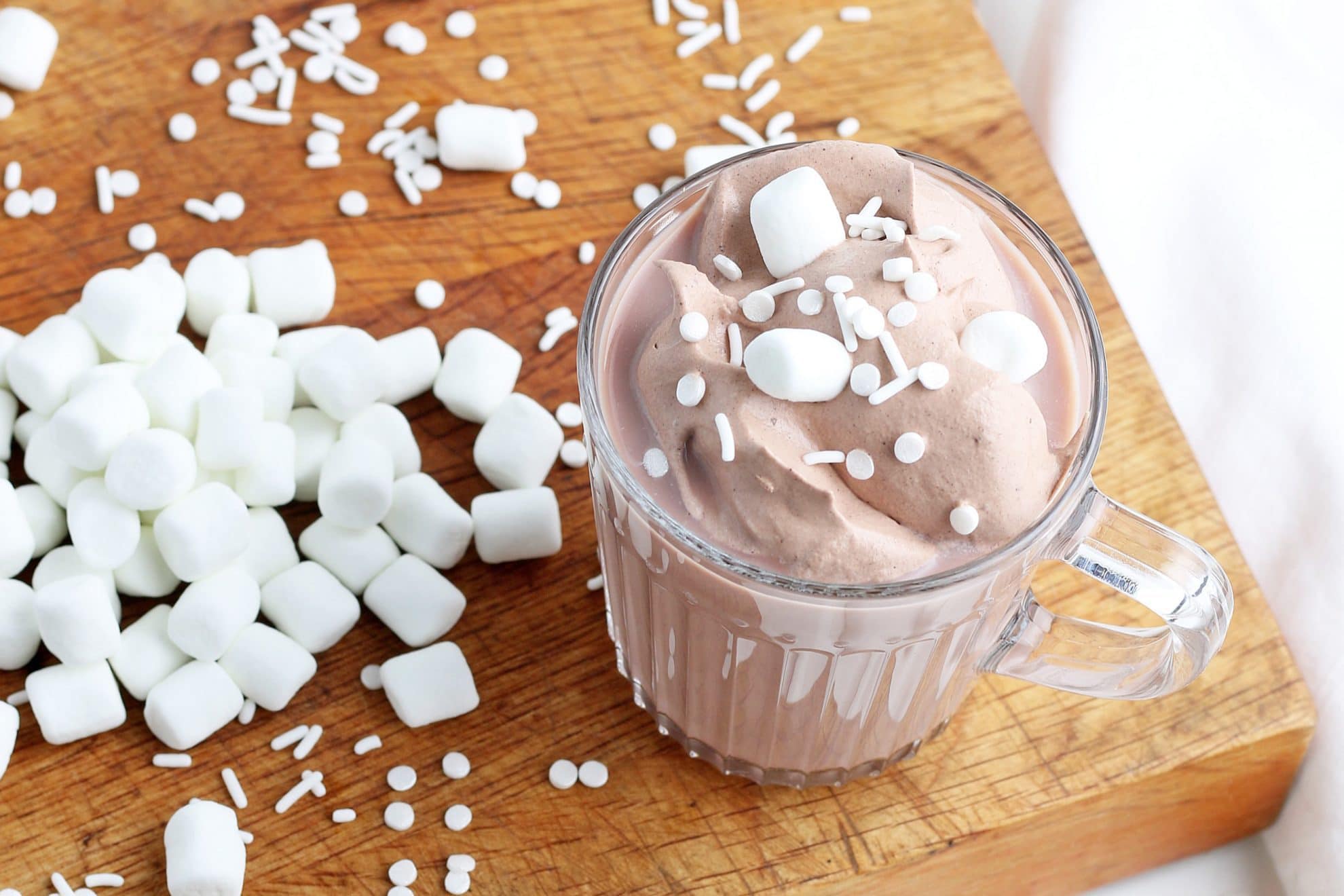 overhead shot of mug of whipped hot chocolate