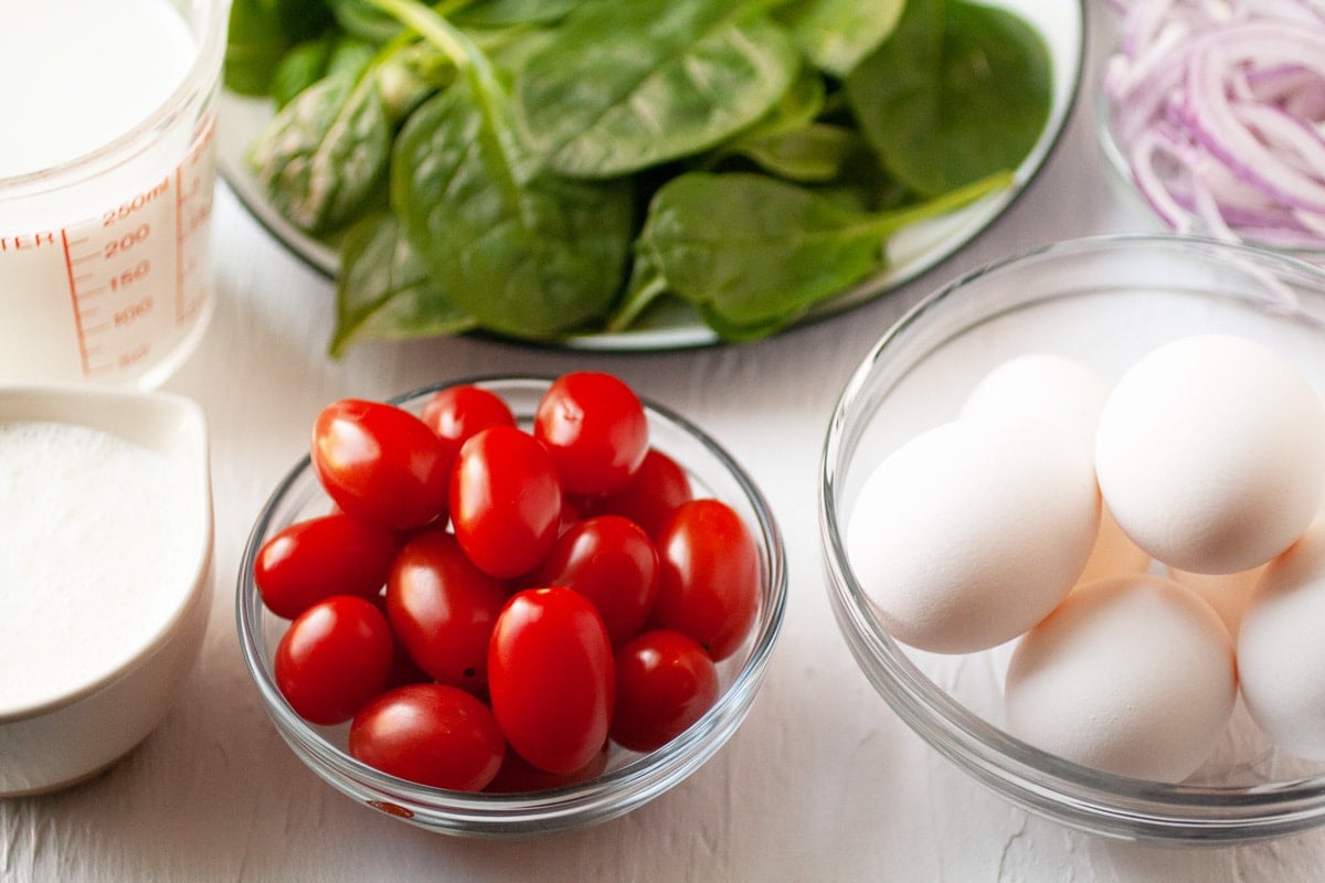 fresh ingredients for crustless spinach quiche 