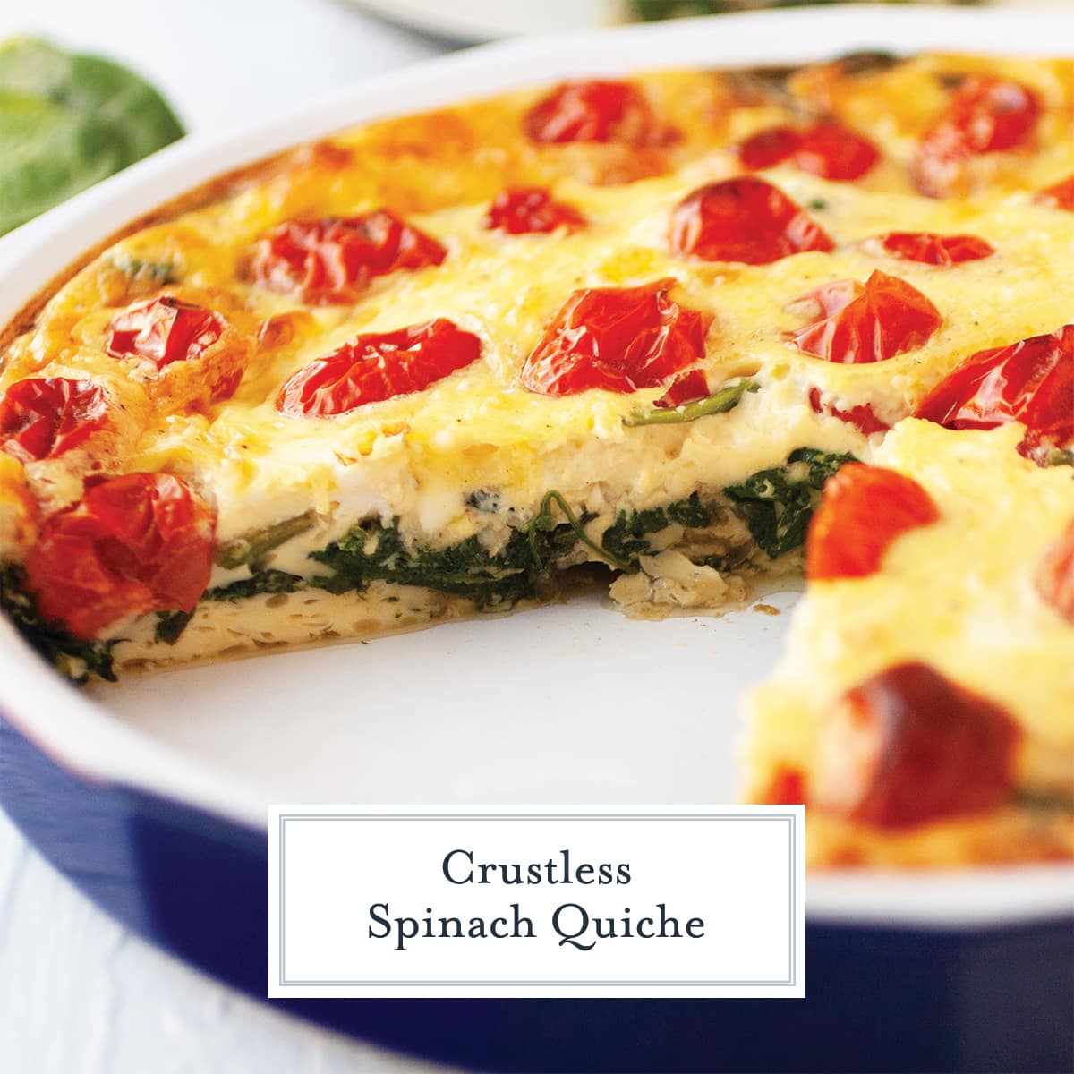 angle view of crustless spinach quiche with tomato topping 