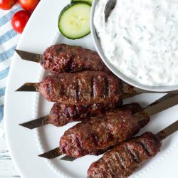 lamb skewers on a plate