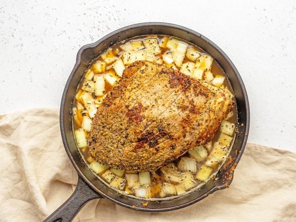 overhead eye of round roast in cast iron