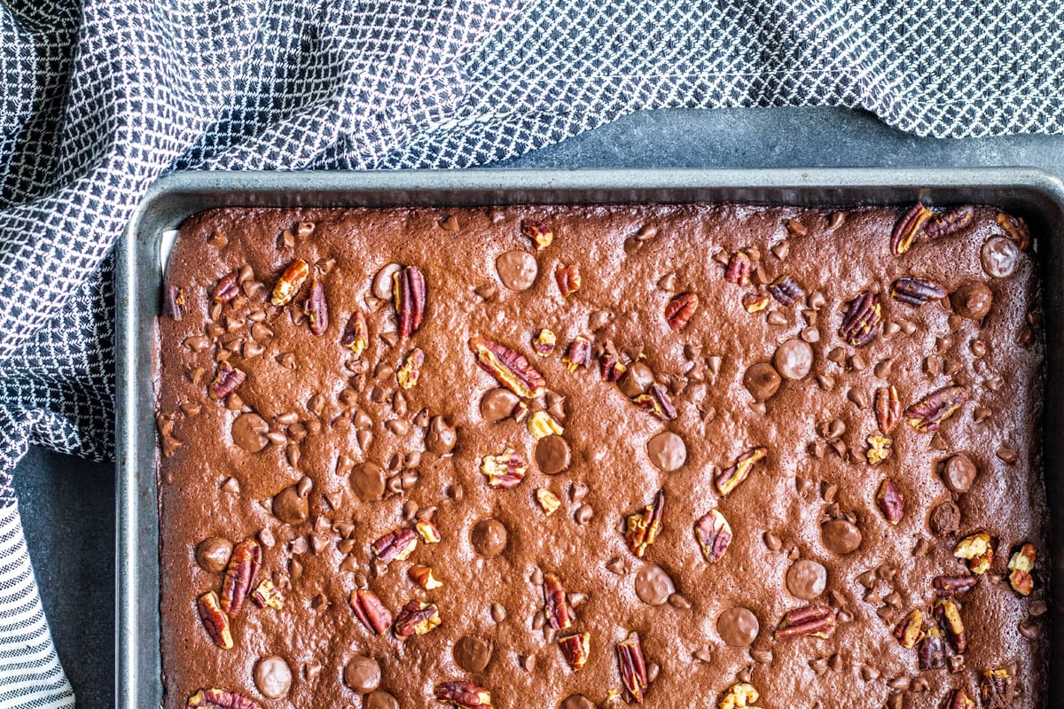 overhead of brownie brittle in a baking sheet 