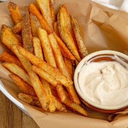 basket of cajun fries with sauce