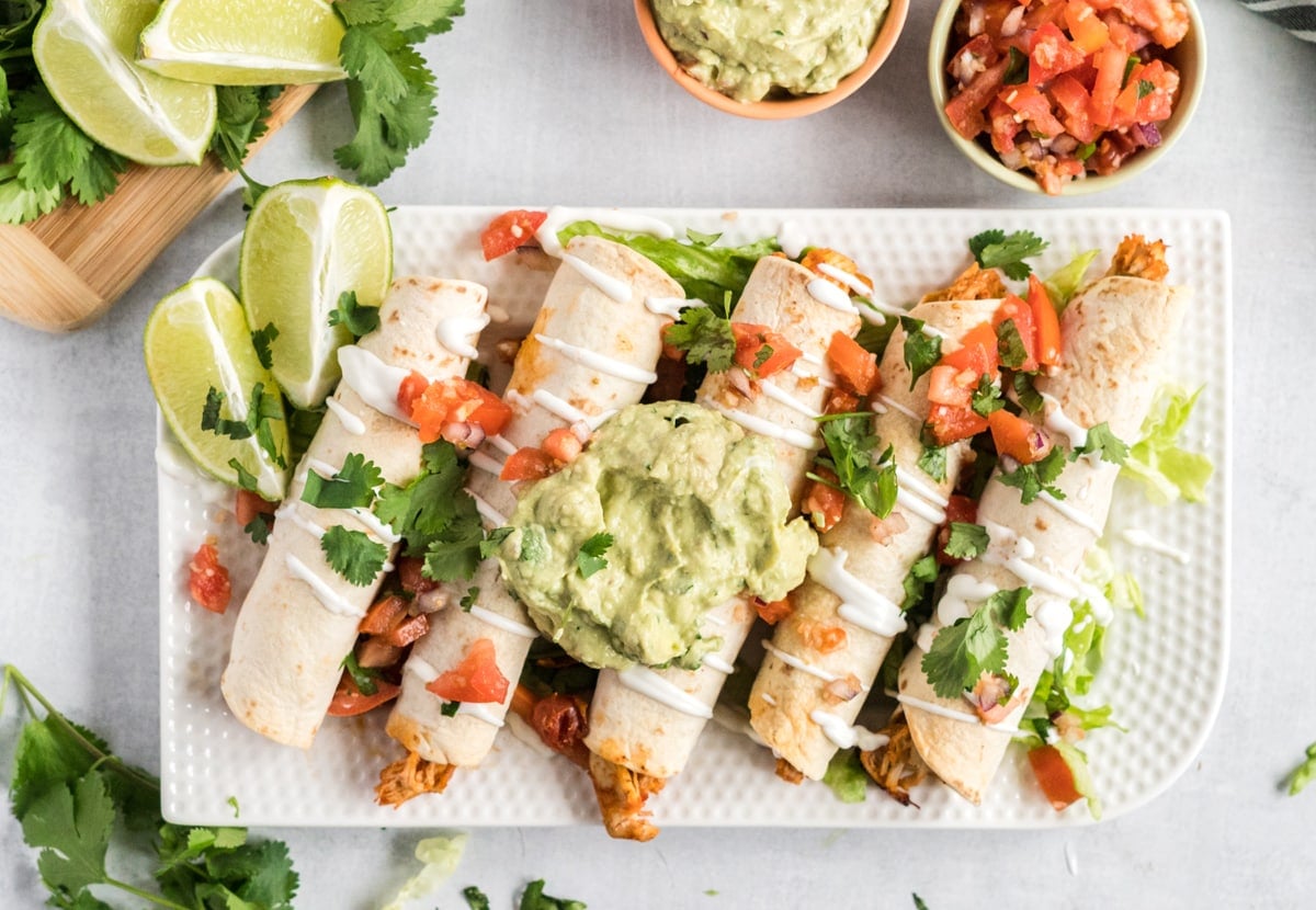 chicken taquitos on a serving platter 