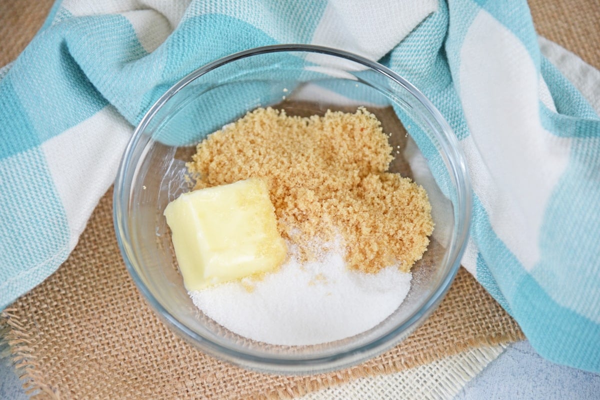 butter, brown sugar and white sugar in a bowl 