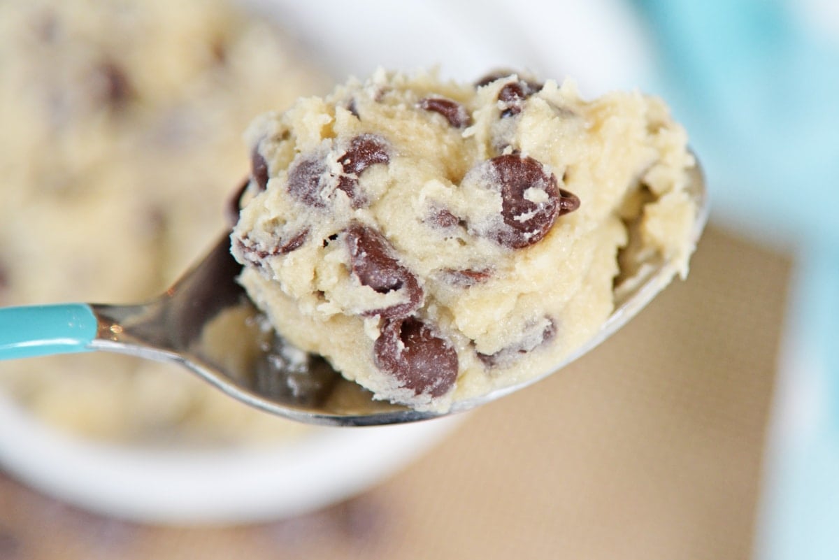 close up of cookie dough on a spoon 