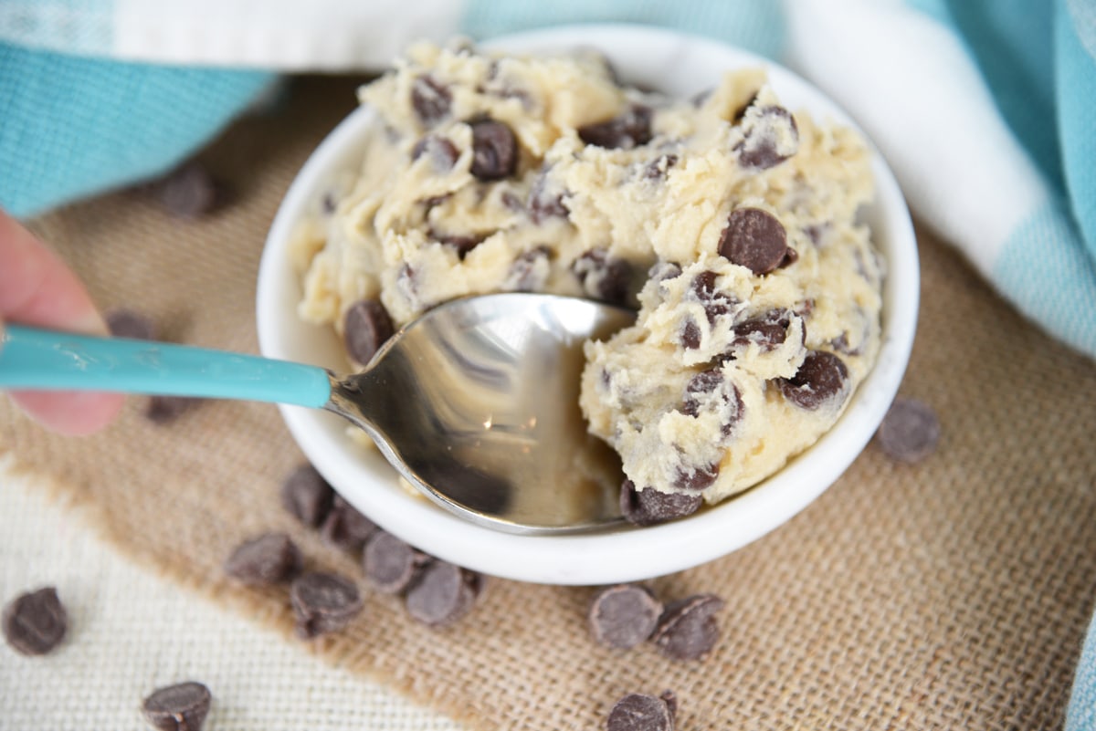 spoon digging into cookie dough 