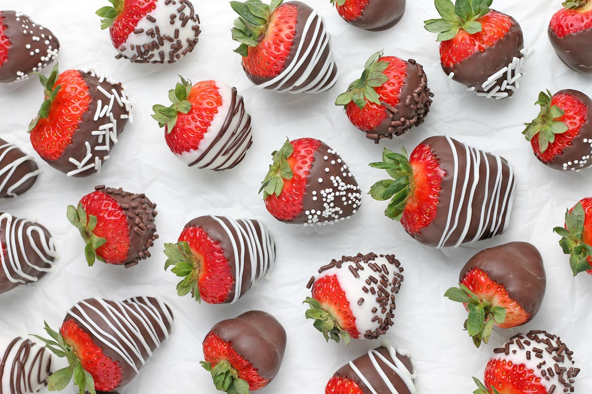 chocolate covered strawberries on parchment