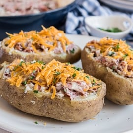 creamed chipped beef stuffed potatoes on a plate