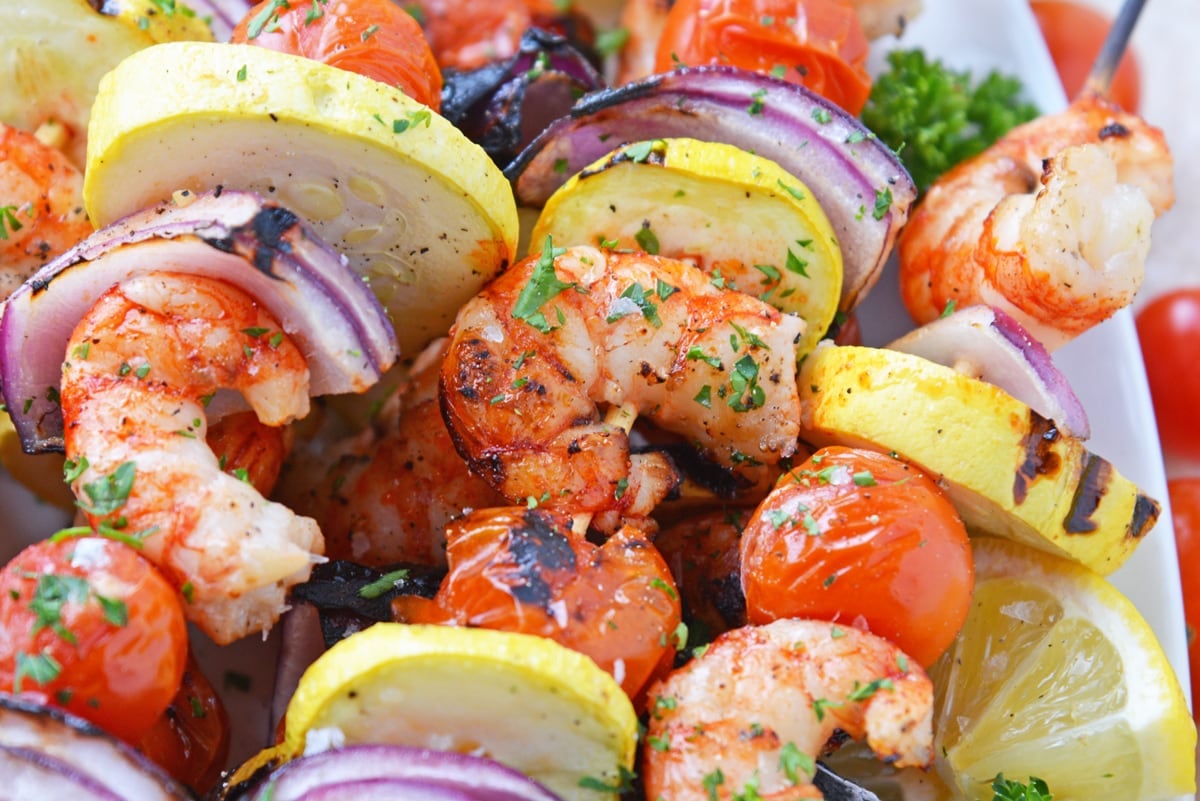 close up angled shot of garlic shrimp kabobs