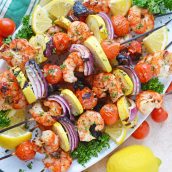 overhead shot of tray of garlic shrimp kabobs