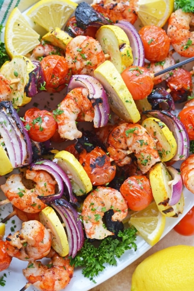 overhead shot of tray of garlic shrimp kabobs