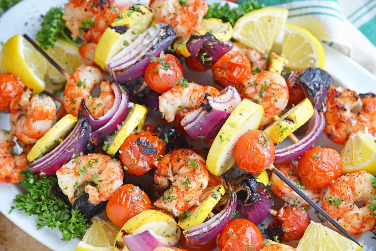 overhead shot of platter of garlic shrimp kabobs