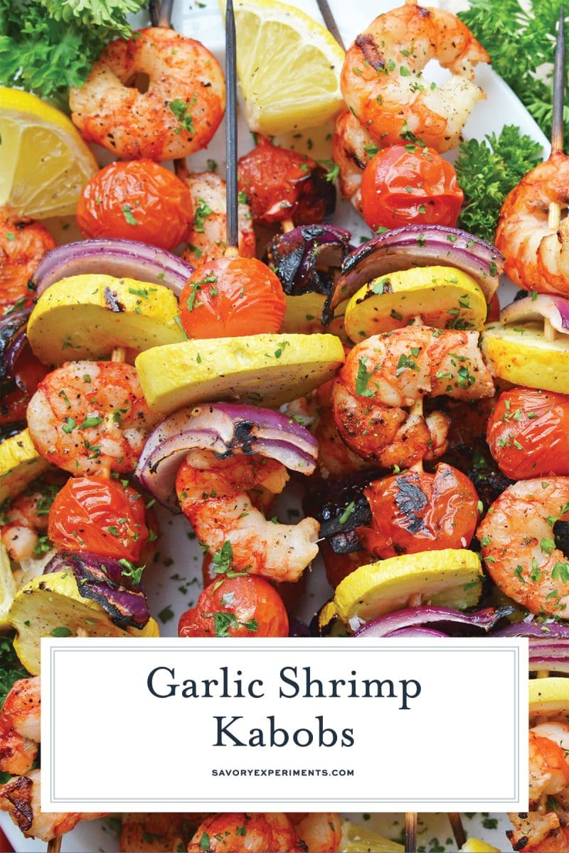 close up overhead shot of garlic shrimp kabobs with text overlay for pinterest
