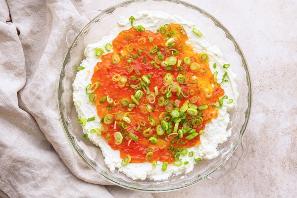 goat cheese dip with pepper jelly and scallions