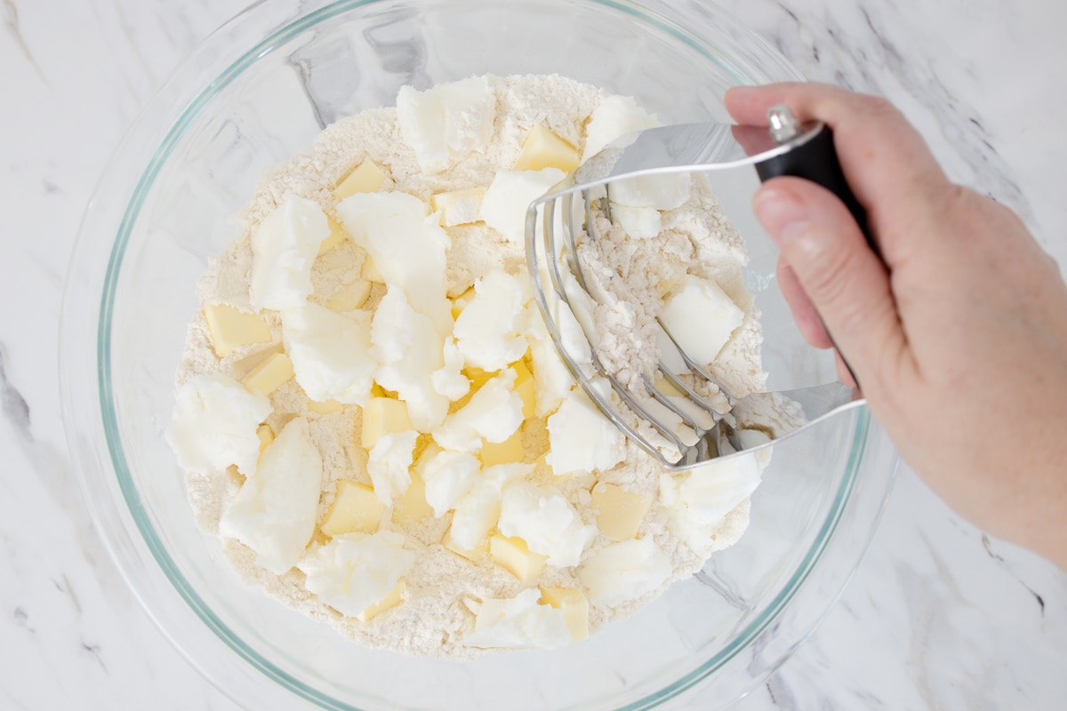 cutting together fats in a pie crust 