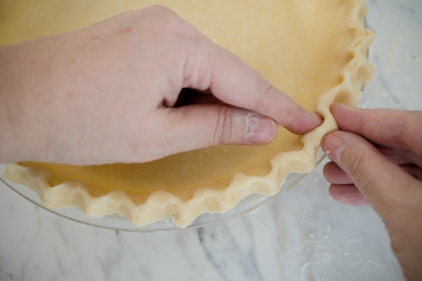 pinching together pie crust