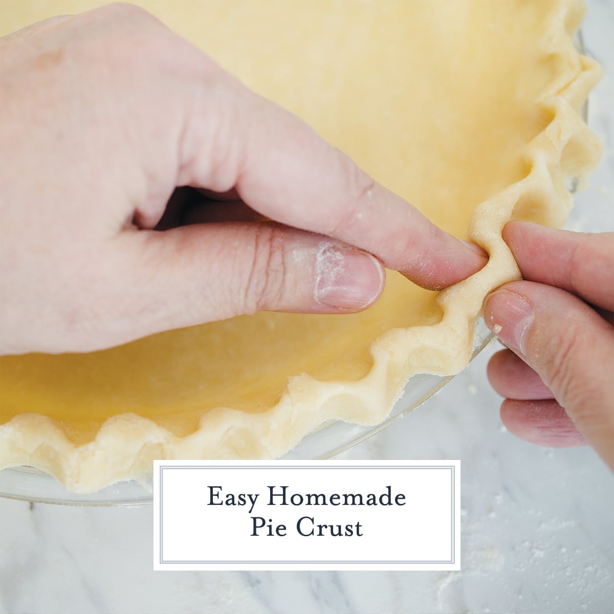 fingers pinching together a pie crust 