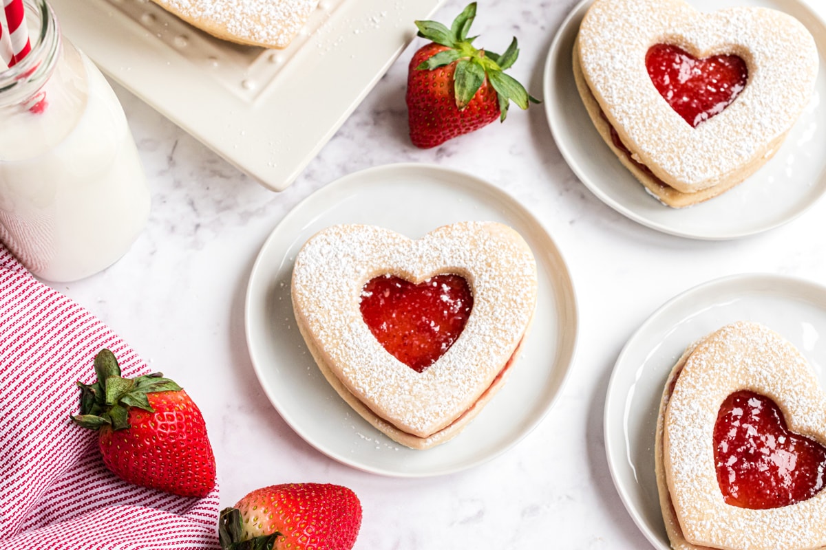 strawberry jam cookie on small what plates with fresh strawberries  