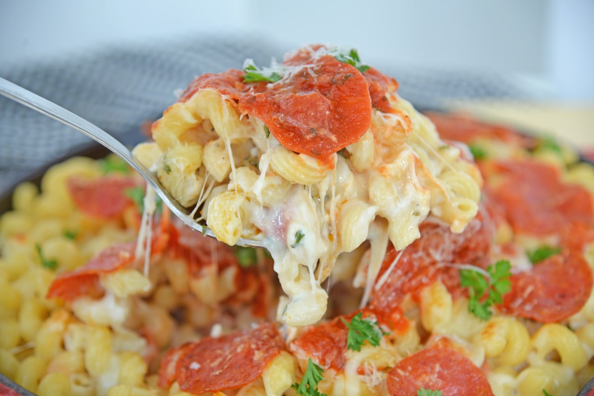 spoon of cheesy mac and cheese