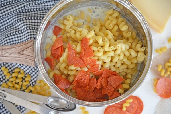 pasta, cheese sauce and chopped pepperoni