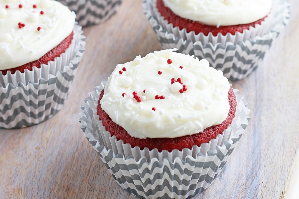 red velvet cupcakes on a wood background 