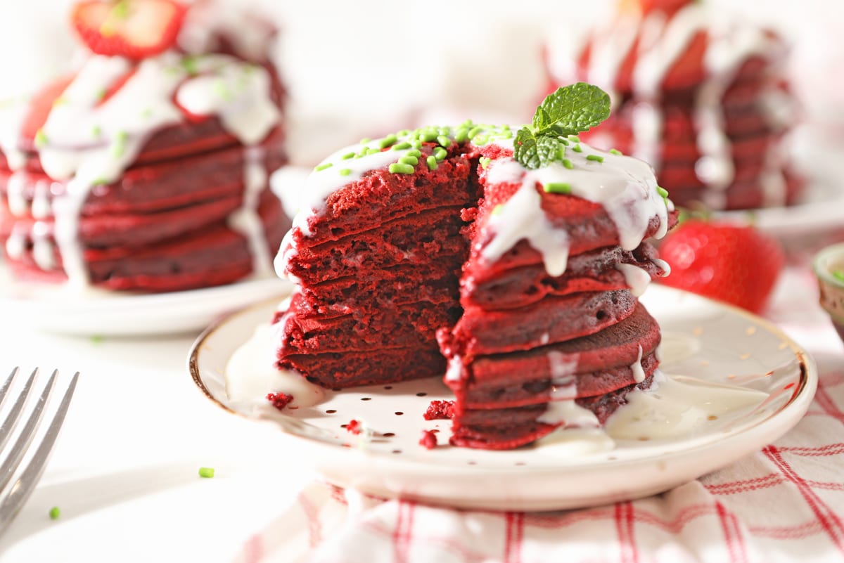 stack of red velvet pancakes cut into 