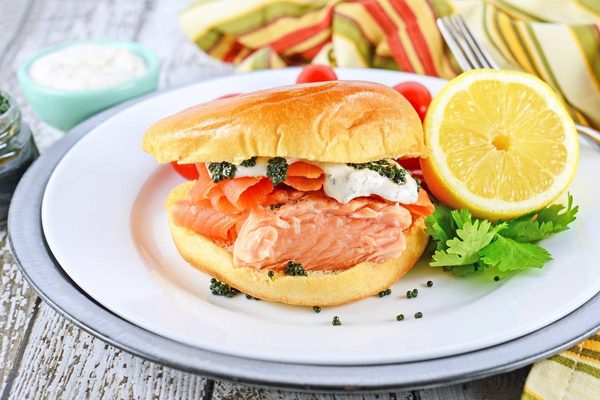 plated salmon sandwich with spread 