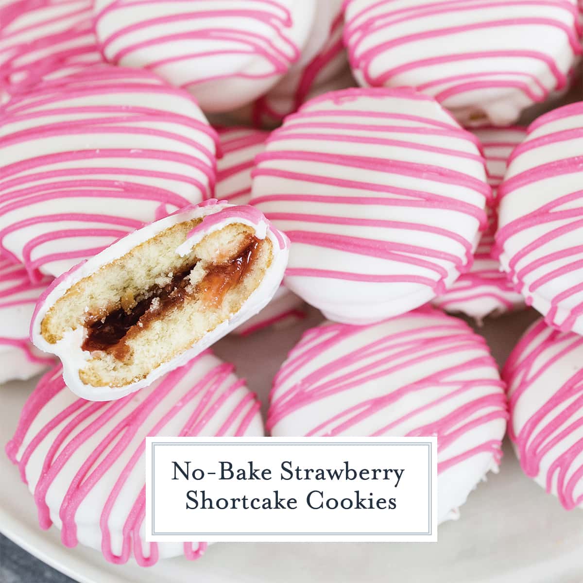 close up of no bake strawberry shortcake cookies with one biten 