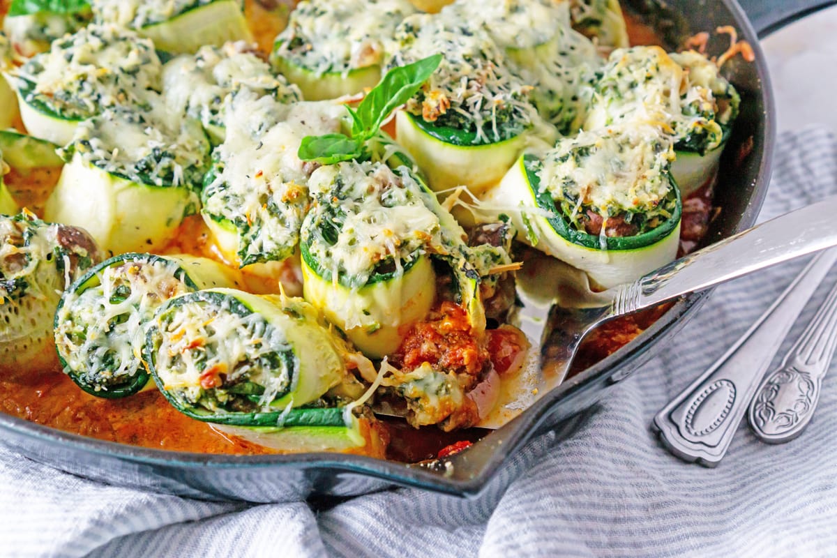 spoon scooping out zucchini lasagna