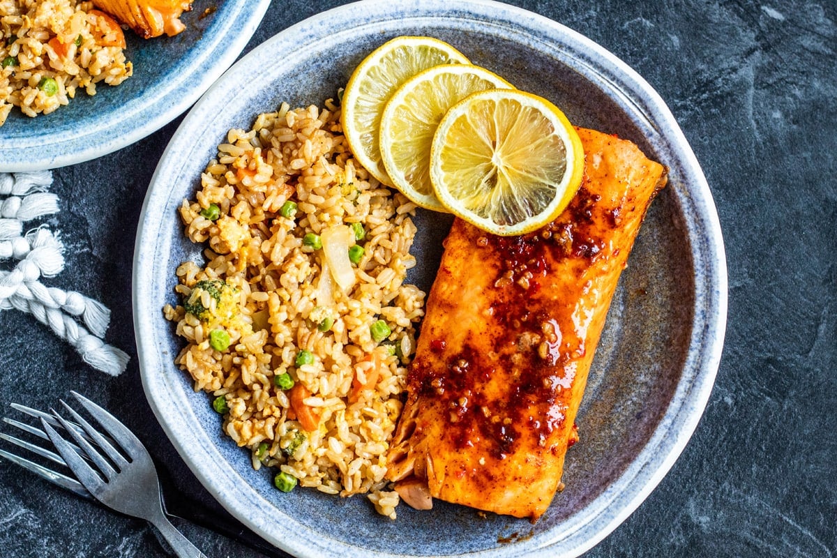 air fryer salmon on a plate with fried rice