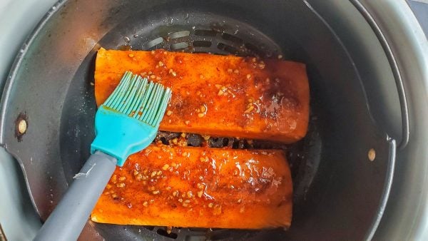 salmon in an air fryer basket