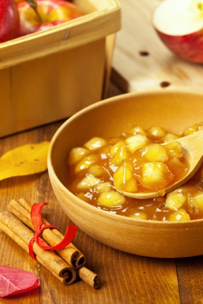 bowl of apple pie filling with cinnamon sticks