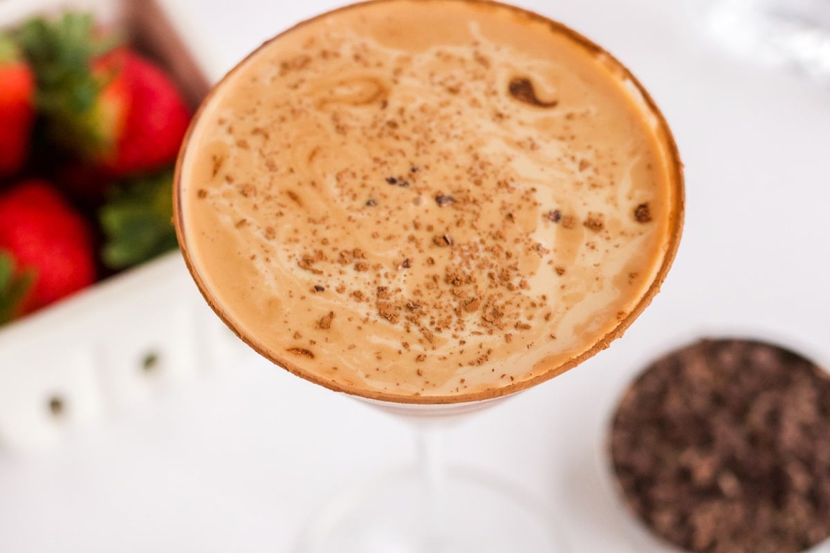 overhead of chocolate martini with cocoa powder topping 