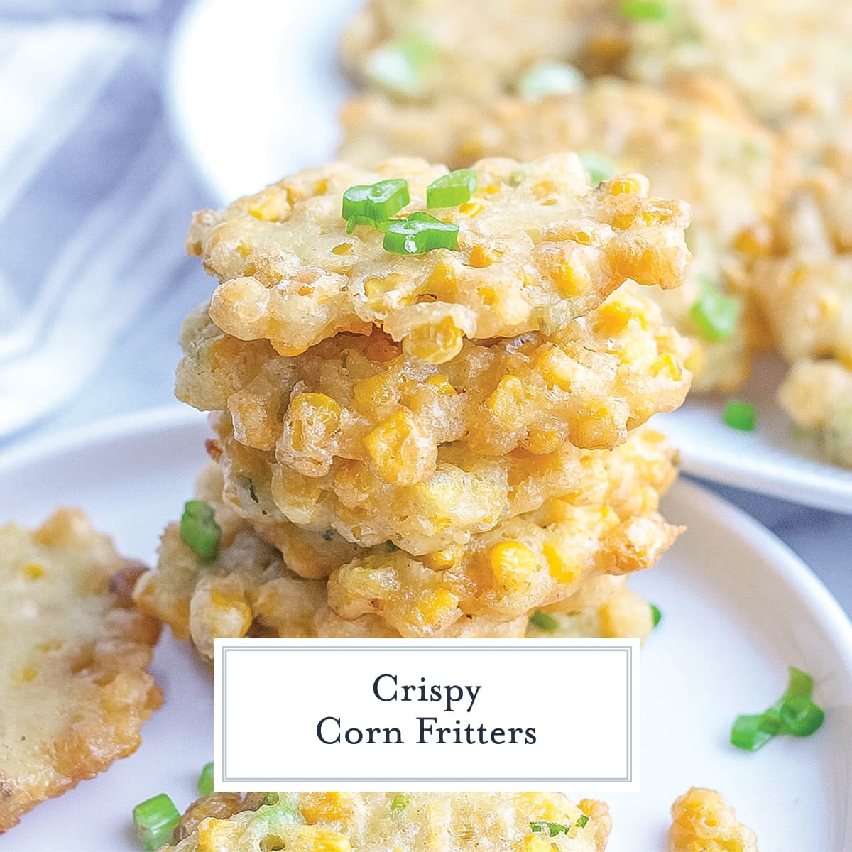 stack of fried corn fritters with scallions