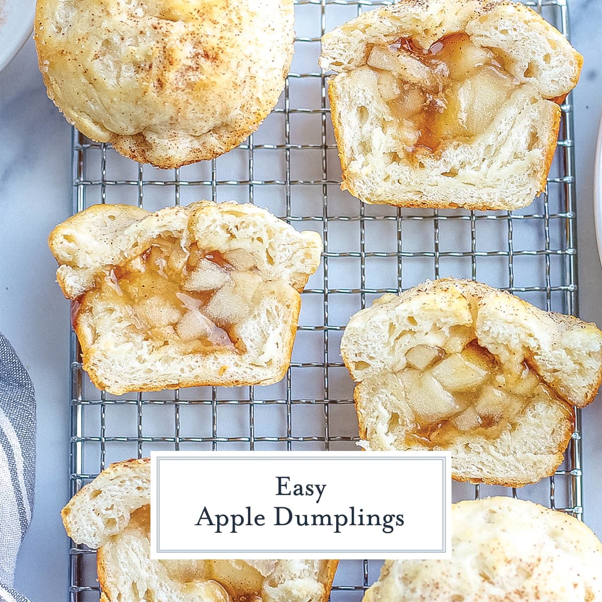 cut open apple dumplings on a wire rack