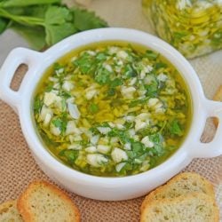 close up of garlic relish in a shallow white bowl