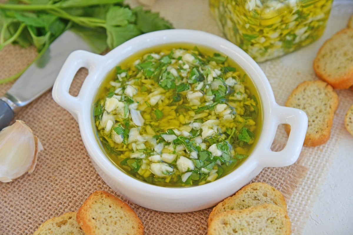 close up of garlic relish in a shallow white bowl