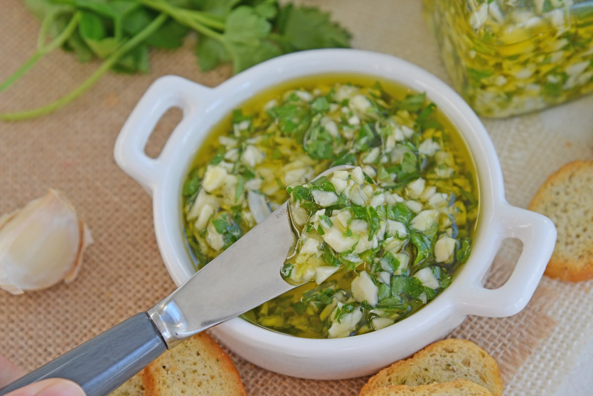 garlic relish on a small knife  