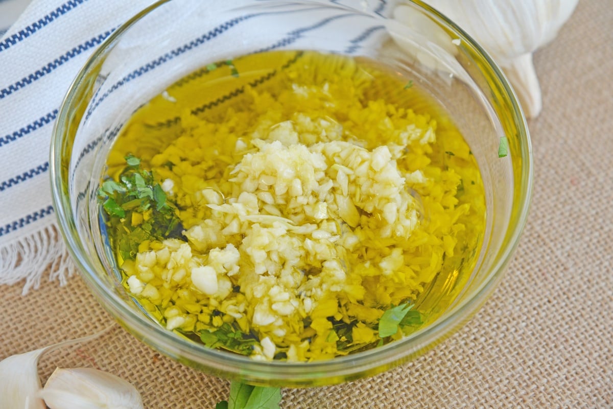 angle view of garlic relish in a small glass bowl 