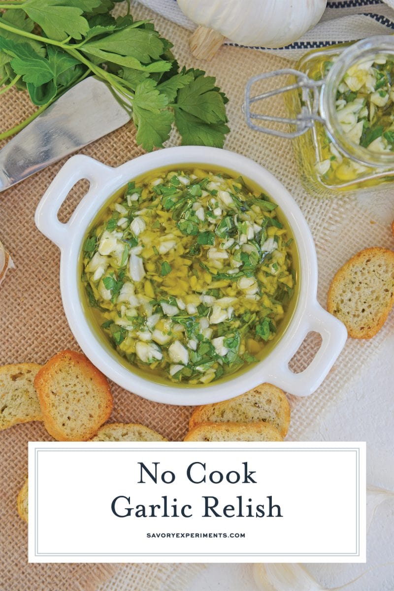 close up of garlic relish in a serving bowl with crostini 