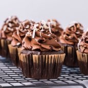 german chocolate cupcakes on a cooling rack