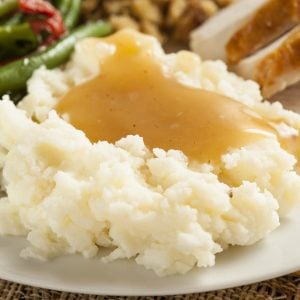 homemade gravy over mashed potatoes