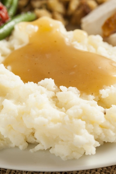 homemade gravy over mashed potatoes