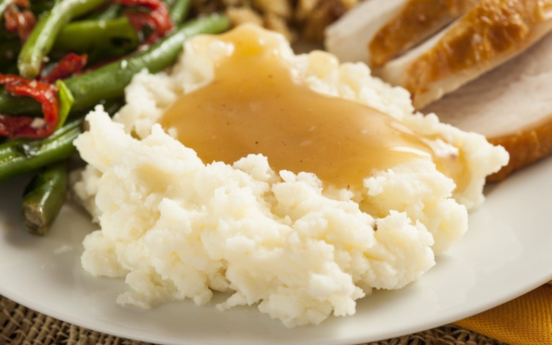 homemade gravy over mashed potatoes