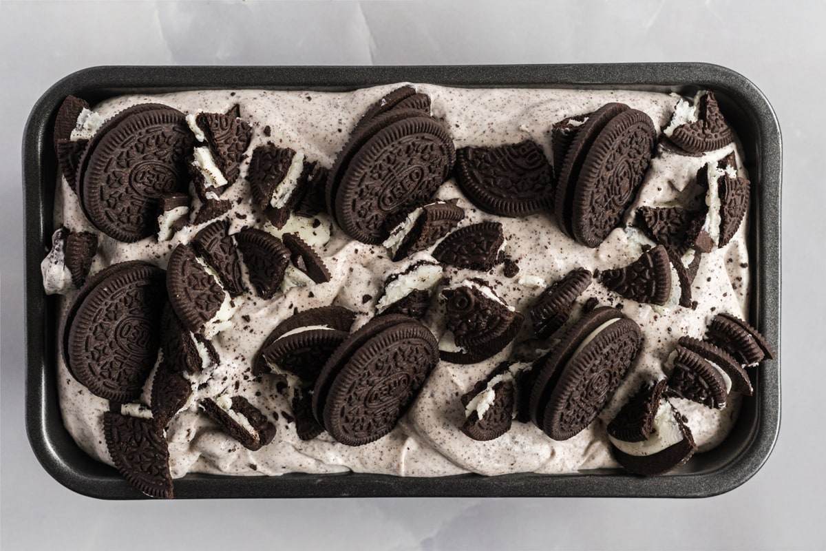 placing ice cream in a loaf pan 