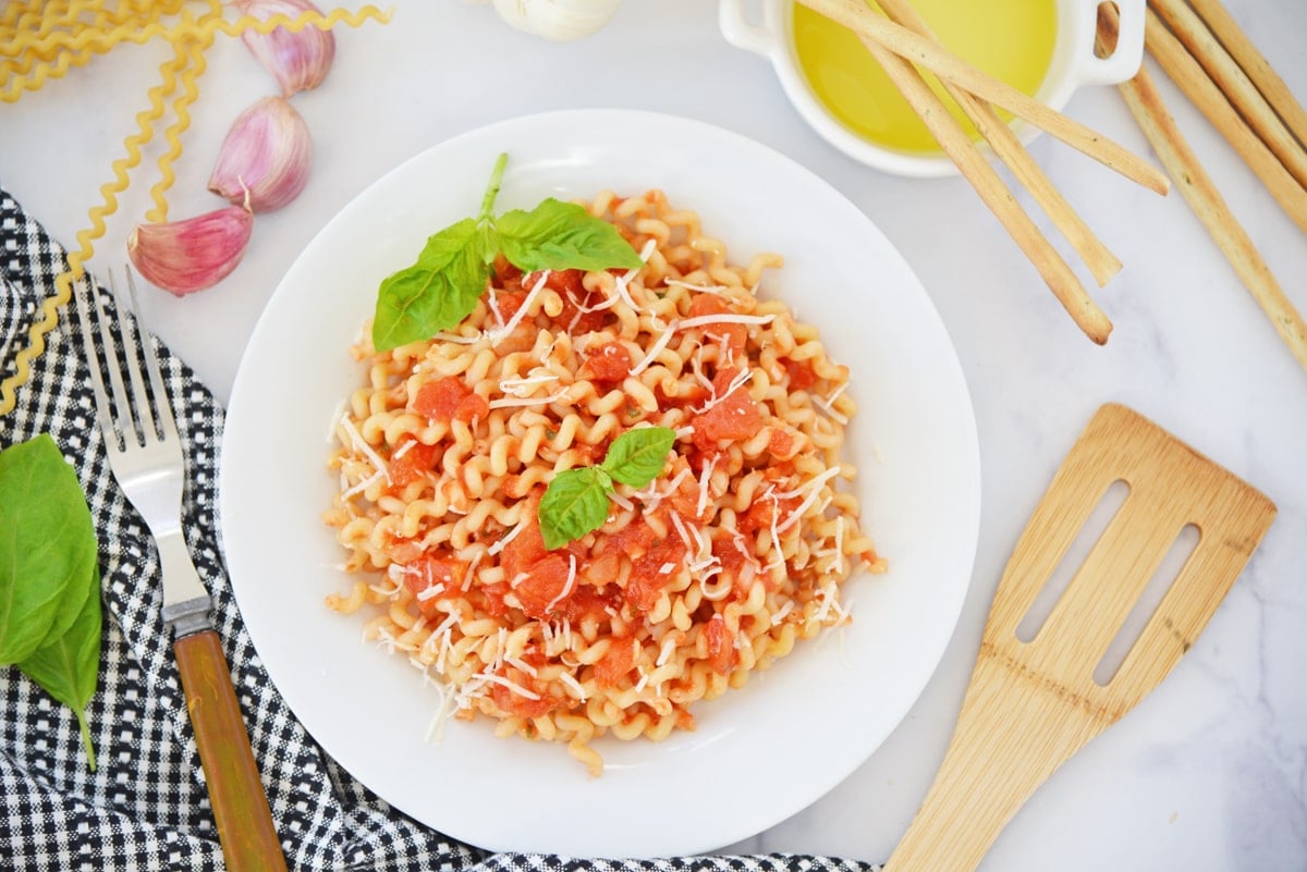 overhead of homemade pomodoro sauce over pasta 