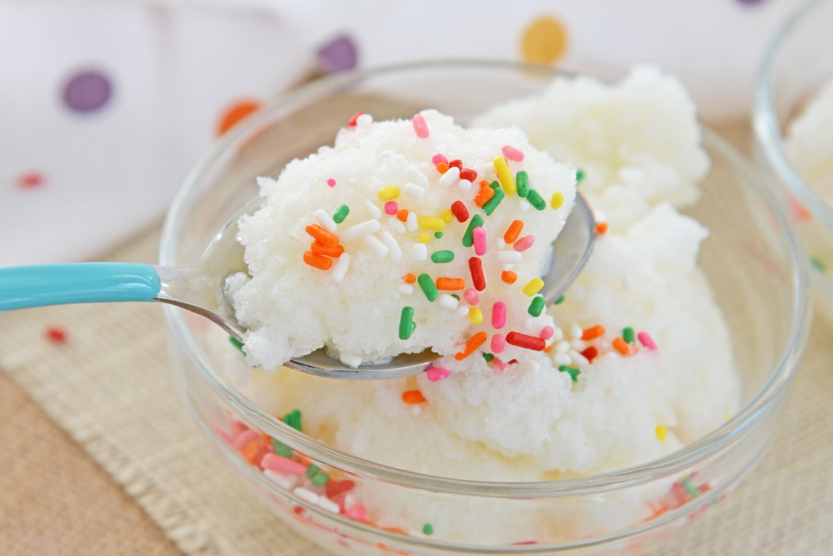 spoon of snow cream with sprinkles 