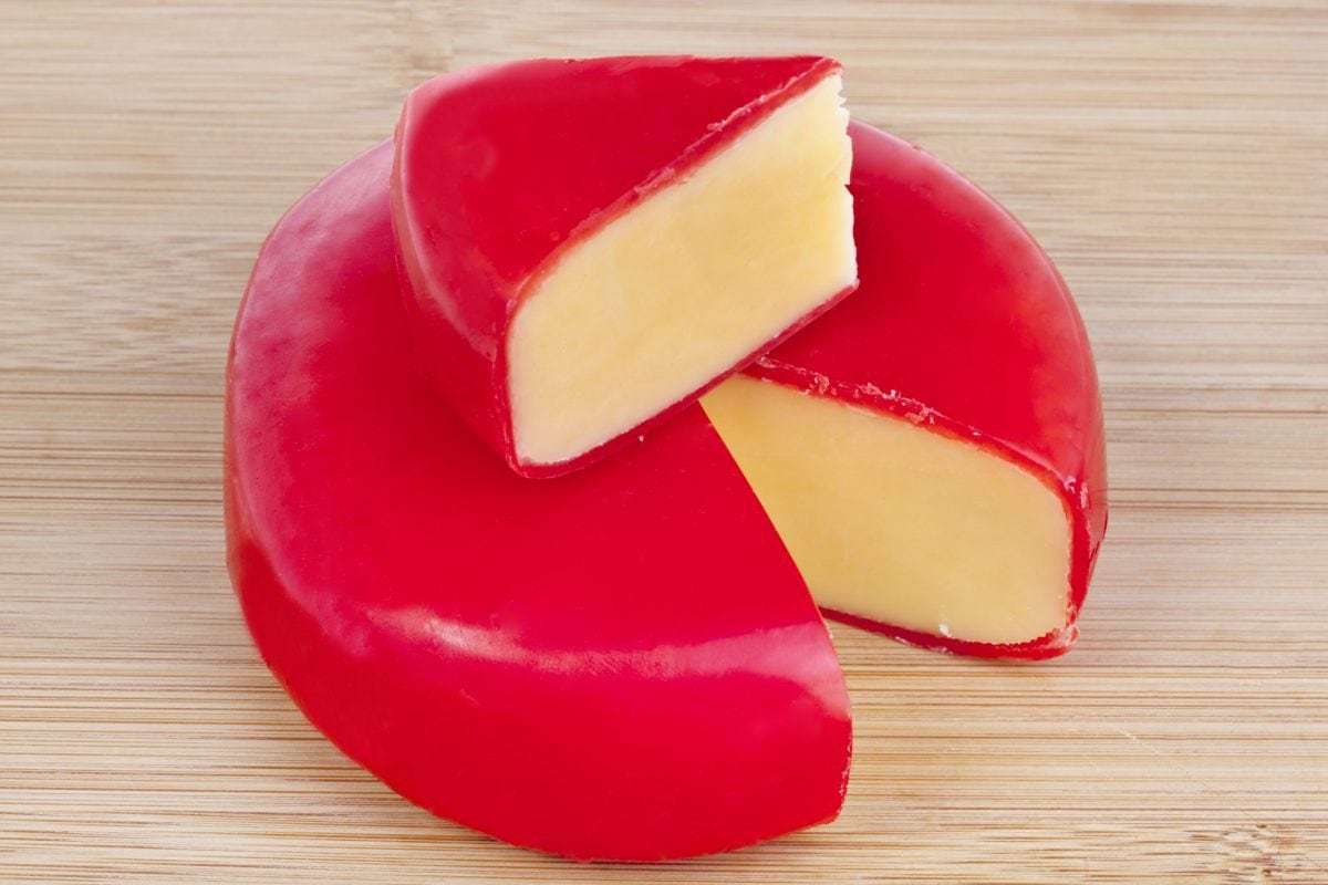 wheel of smoked gouda in red wax 